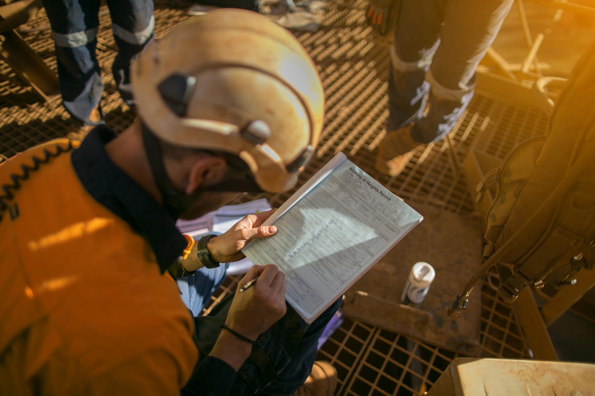 Mining Engineer Filling out Form on Site